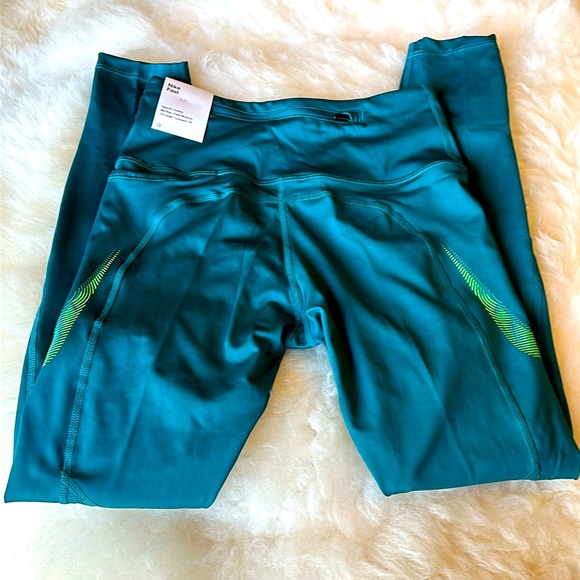 Nike Fast Leggings 
Women's Mid-Rise 7/8 Running Leggings with Pockets Sz XS - Picture 3 of 10